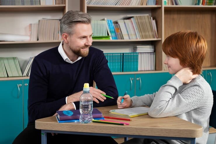 Professional male tutor providing one-on-one academic coaching and home tuition to a young student in Karachi.